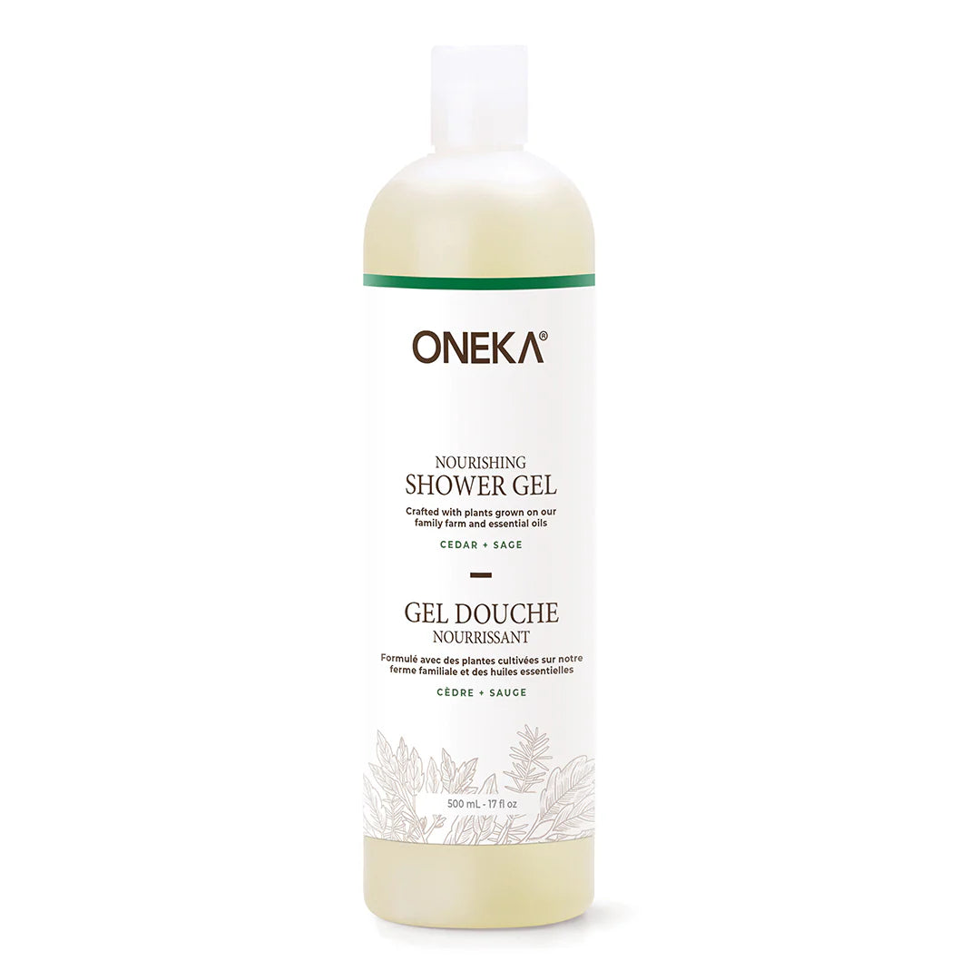 A BPA-free plastic bottle of Oneka Nourishing Shower Gel with Cedar & Sage label, indicating it is a plant-based and organic shower gel.