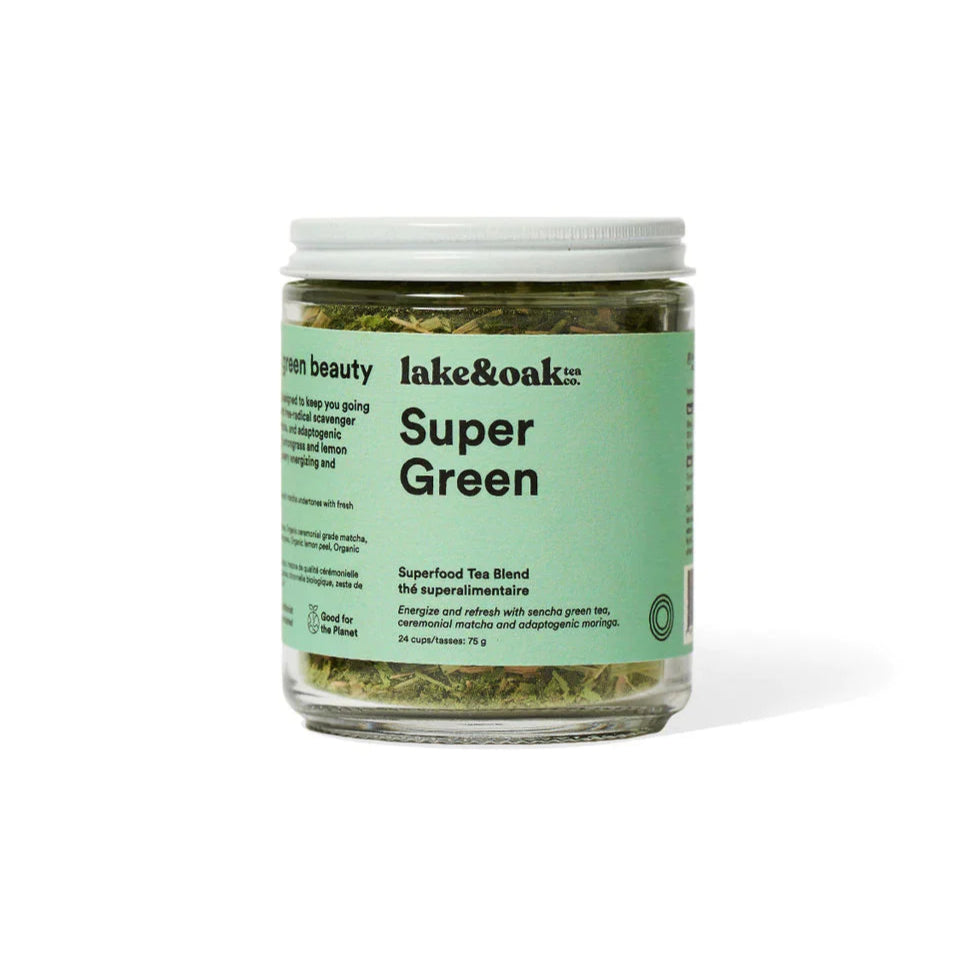 A glass jar containing Lake & Oak Super Green sencha. matcha and moringa tea blend with a green label on a white background.