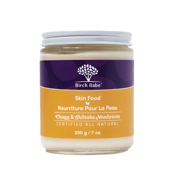 A jar of Birch Babe Skin Food with a label that reads 'chaga and shiitake mushroom' indicating the adaptogenic ingredients in this formula.