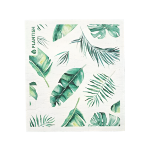A white Swedish sponge cloth with an assorted tropical greenery pattern design.