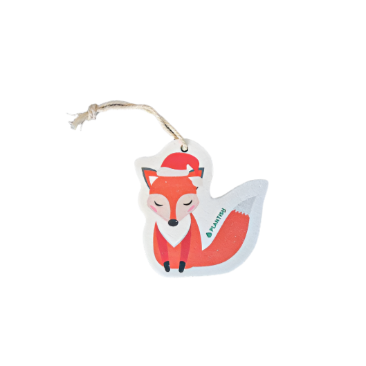 A pop up sponge ornament featuring a red fox wearing a santa hat, attached to a string.