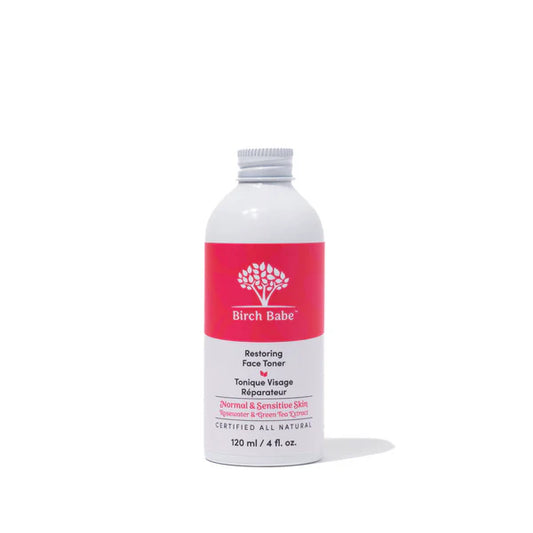 A white aluminum  bottle of Birch Babe's all natural restoring face toner on a plain background. This is the refill format with a low waste lid instead of a spray top.