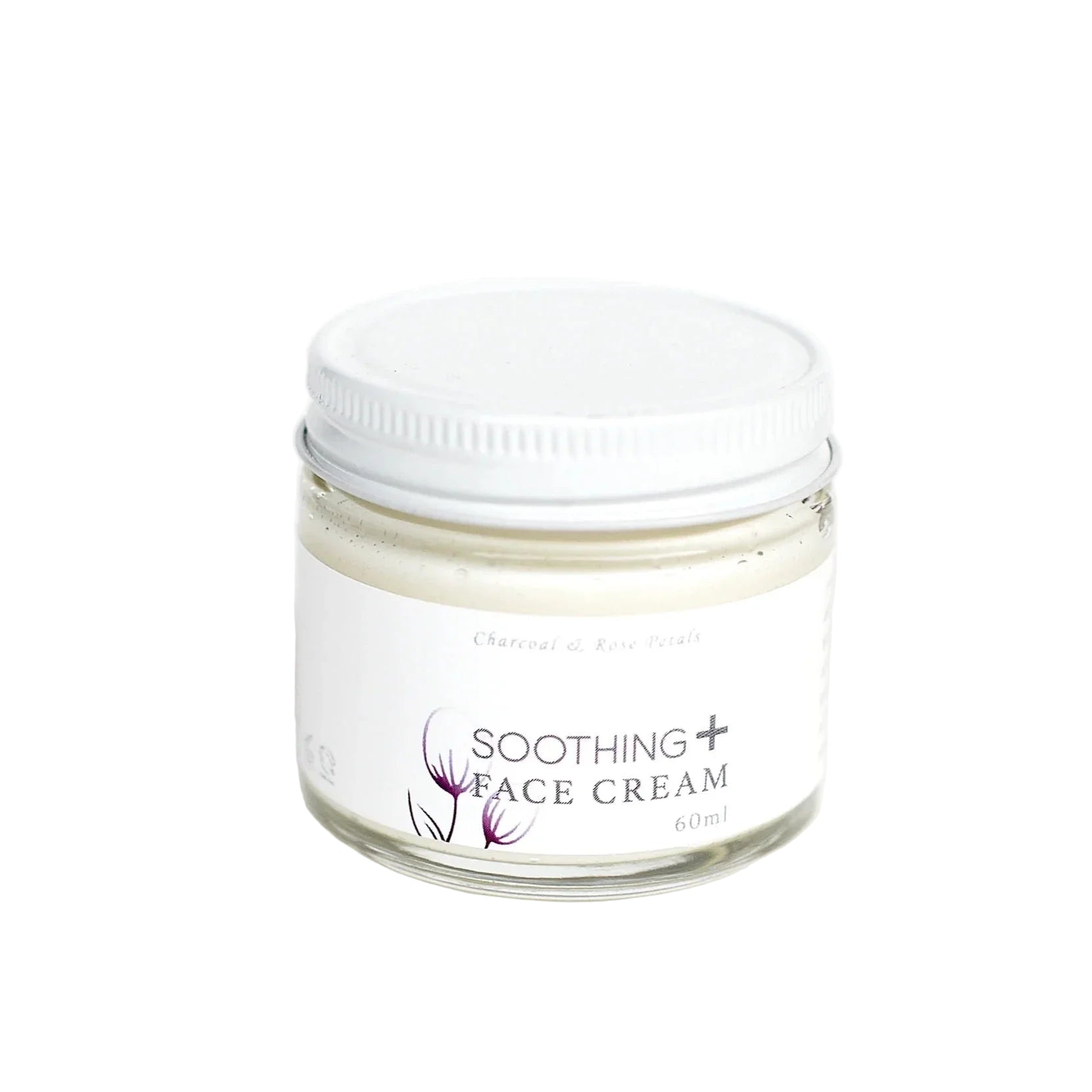 Jar of soothing face cream on a white background